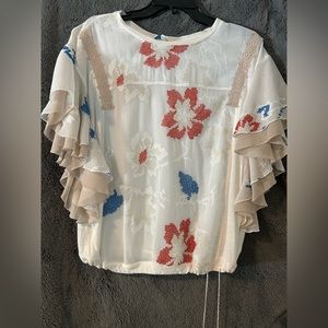 Tiny blouse size medium